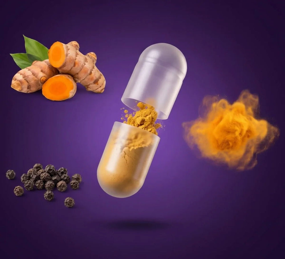 A Gold Guard capsule opened: fresh turmeric root, golden turmeric extract powder and black peppercorns